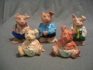 4 Wade NatWest piggy banks with Baby, Sister, Brother, Mother and 1 other similar baby