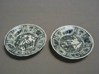2 Oriental blue and white saucers, the reverse with character mark 6"