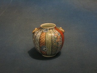 An Imari globular shaped twin handled porcelain vase 3"