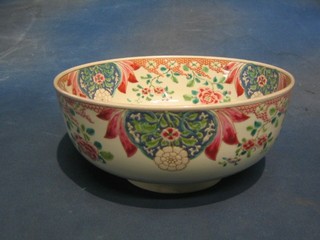 A 19th Century Oriental famille vert porcelain bowl with floral decoration, 2 character marks to the base, (some wear to the interior) 10"