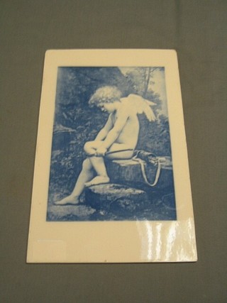 A rectangular 19th Century plaque decorated a seated Cupid with bow 12" x 8"