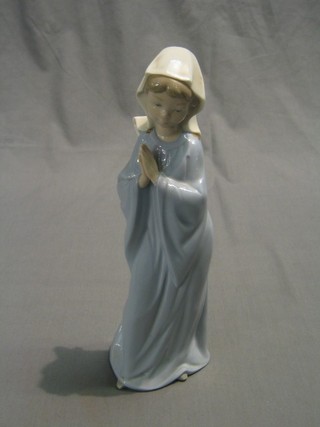 A Nao figure of a standing novice nun 11"