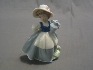 A Nao figure of a standing bonnetted girl with urn and cover 7"