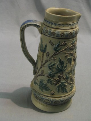 A German salt glazed jug decorated Bacchus and vinery 10"
