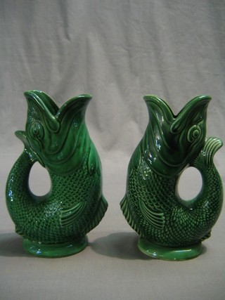 A pair of green glazed Dartford gurgling fish jugs 9"