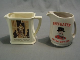 An HCW Arthur Bell Whiskey water jug (chip to base) and a Wade Beefeater Gin water jug