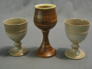 A pair of John Chipperfield Art Pottery goblets and  an Iden Pottery goblet