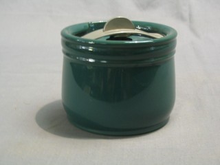 A circular green glazed Royal Doulton tobacco jar and cover 4"