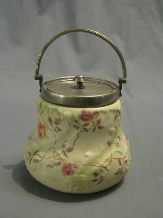 A circular pottery biscuit barrel with silver plated mounts