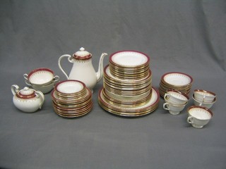A 66 piece Aynsley Durham pattern dinner service comprising 5 dinner plates 10 1/2", 5 side plates 8 1/2", 10 soup bowls 8 1/2", 12 tea plates 6 1/2", 9 saucers 6", 11 saucers 5 1/2", 6 dishes 5", 2 twin handled soups bowls, 5 cups, lidded sucrier and a coffee pot