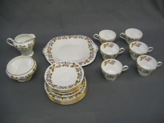 A 20 piece Aynsley April Rose pattern tea service comprising twin handled bread plate 9", 5 tea plates 6 1/2", 6 cups and 6 saucers, sugar bowl and cream jug, together with an 11 piece Elizabethan Chelsea pattern coffee service comprising 6 cups and 5 saucers