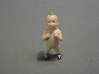 A biscuit porcelain "Pear's Soap" figure of a standing child, the base marked P47 5"
