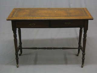 An Edwardian oak writing table fitted 2 drawers, raised on turned supports united by H framed stretcher 42"