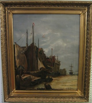 P Peters,  oil on canvas "Dutch? Harbour with Boats, Buildings etc" 23" x 19" contained in a gilt frame (slight hole to centre) 