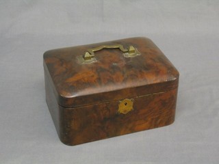 A Victorian figured walnut cushion shaped trinket box with hinged lid 10"