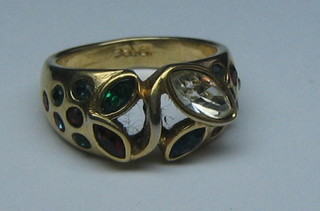 An 18ct gold dress ring set semi-precious stones