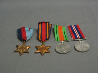 A group of 3 medals comprising 1939-45 Star, Burma Star, Defence and British War medal complete with original box