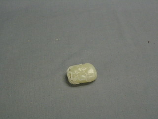 An Eastern jade coloured carved stone with vinery decoration 2"