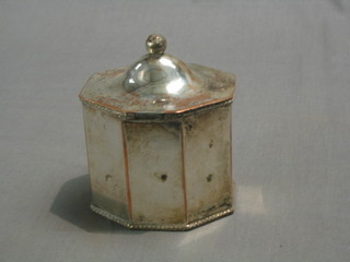 An octagonal silver plated caddy with hinged lid 3"