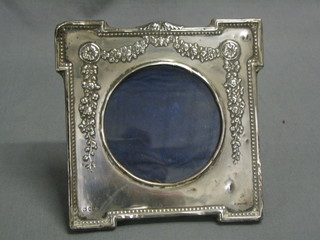 A square silver easel photograph frame embossed swags, 6" x 5" Birmingham 1907   