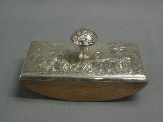 A handsome embossed Dutch silver blotter decorated figures picnicking, 6"