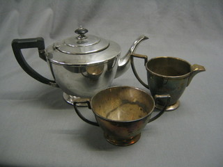 An Art Deco 3 piece circular silver plated tea service by Mappin & Webb