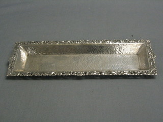 A planished silver rectangular snuffer tray with pierced mounts 9"