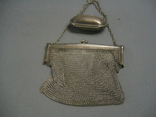 A silver plated purse and a lady's silver plated chain mail evening bag