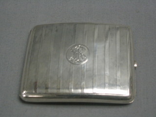 A  silver cigarette case with engine turned decoration Birmingham 1938, 4 ozs