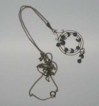 A pierced gilt metal pendant hunt on a gilt chain