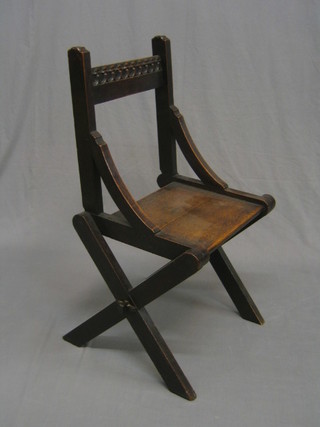 A 19th Century oak Glastonbury hall chair