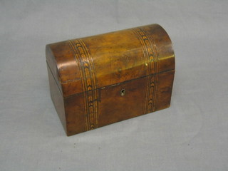 A Victorian domed walnut twin compartment tea caddie with parquetry banding 8"