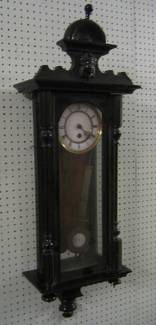 A 19th Century Vienna style regulator with 5" circular enamelled dial contained in an ebonised case