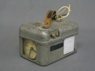 A racing pigeon clock by S T B, contained in a metal case