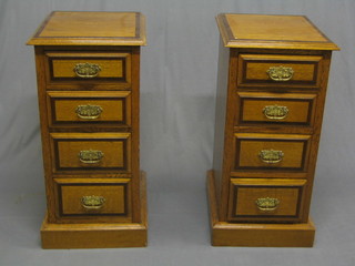 A pair of 19th Century oak and crossbanded mahogany pedestal chests fitted 4 long drawers with brass swan neck drop handles 16" (formerly part of a dressing table)