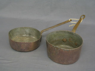 A circular copper saucepan with iron handle 7 1/2" and a shallow saucepan 7 1/2"