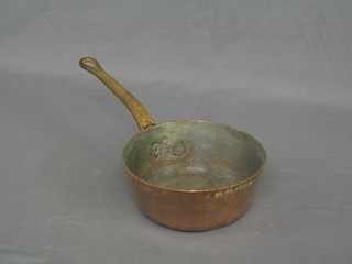 A circular copper milk pan