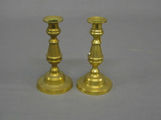 A pair of 18th/19th Century brass candlesticks with ejectors 7"