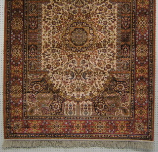A contemporary green ground and floral pattern Belgian Persian design carpet 64" x 48"