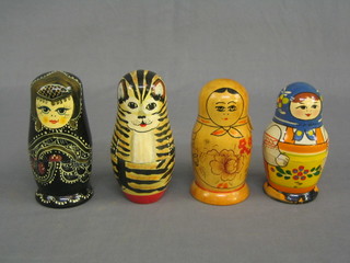 4 various 20th Century Russian dolls