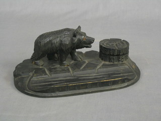 A carved hardwood inkwell in the form of a bear 9"