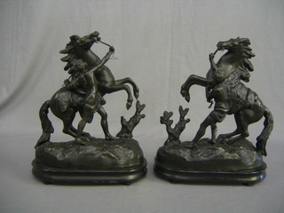A pair of 19th Century spelter Marley horses on wooden bases 14"