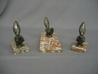 A Spelter figure of 3 birds raised on a marble base