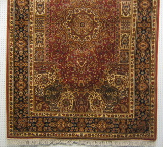 A contemporary rose ground Belgian cotton Persian design rug  92" x 60"