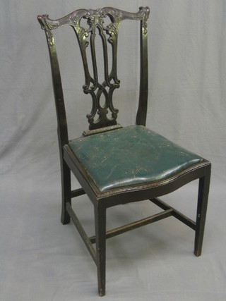 A 19th Century Chippendale style pierced mahogany splat back dining chair, raised on square tapered supports