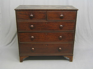 A Georgian mahogany chest of 2 short and 3 long graduated drawers with tore handles, raised on bracket feet 42"