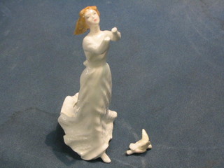 A Royal Doulton blanc de chine figure, Thinking of You, HN3124, hands f and r