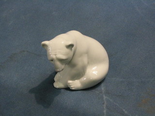 A Lladro figure of a seated polar bear, base impressed C23M, 4"