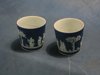 A pair of 19th Century Wedgwood blue Jasperware waisted vase, bases impressed Wedgwood E, 3"