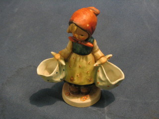 A Goebel figure of a girl with 2 panniers, base impressed 70, 6" 